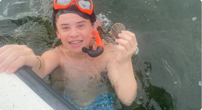 A picture of Why Scalloping Is The Perfect Family-Friendly Activity with Crystal River Fishing Charters