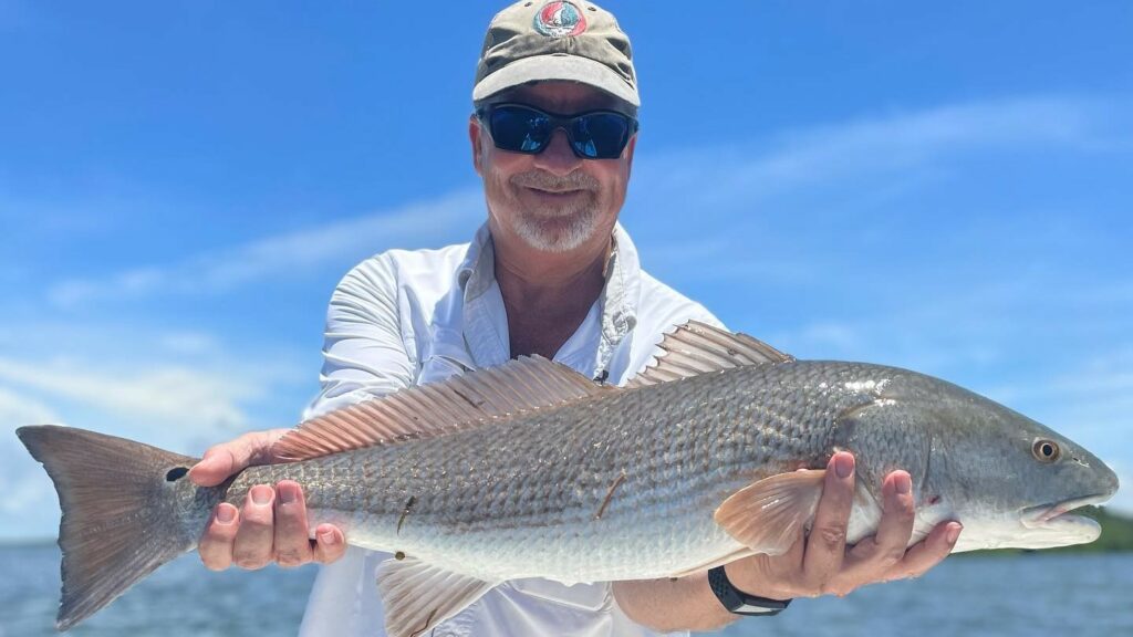 A picture of A Break From The Rain with Crystal River Fishing Charters