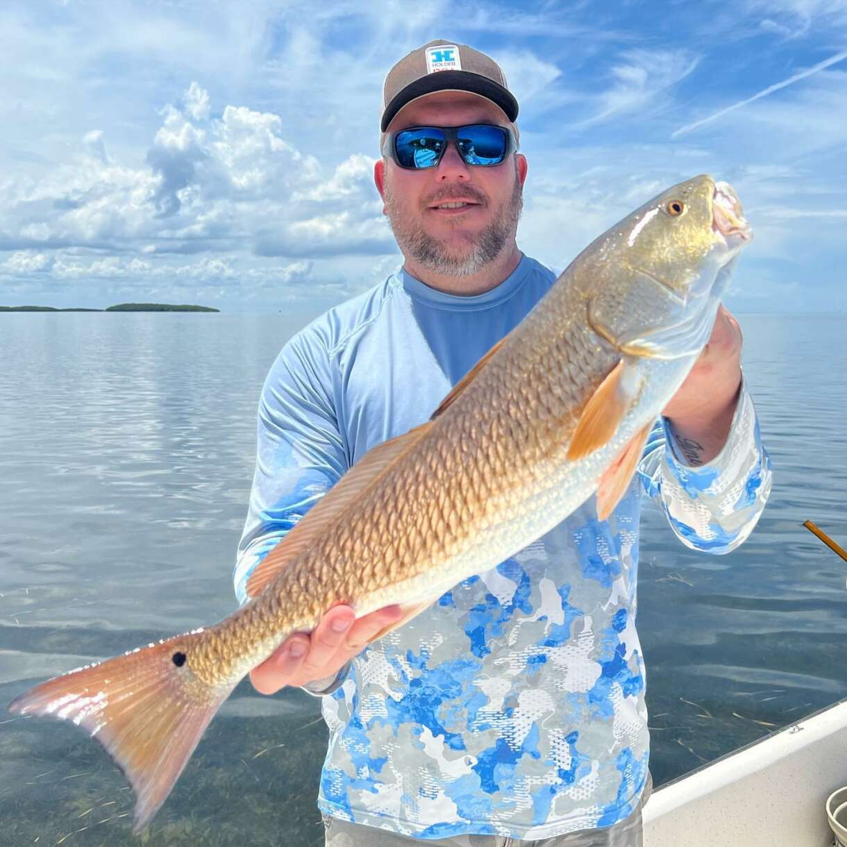 A picture of Inshore Gag Grouper, Mangrove Snapper, and Redfish with Crystal River Fishing Charters